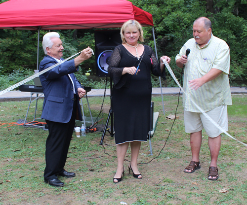 cutting the ribbon on the Russian Cultural Garden